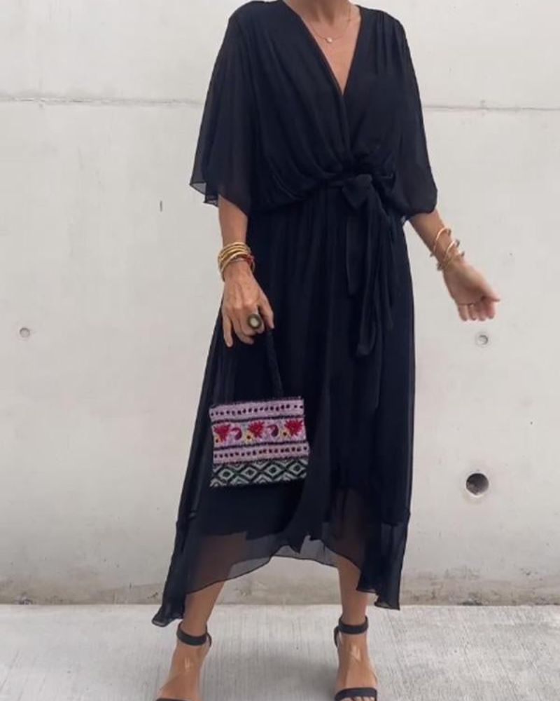 CRISTI - mjukt fallande korsad klänning