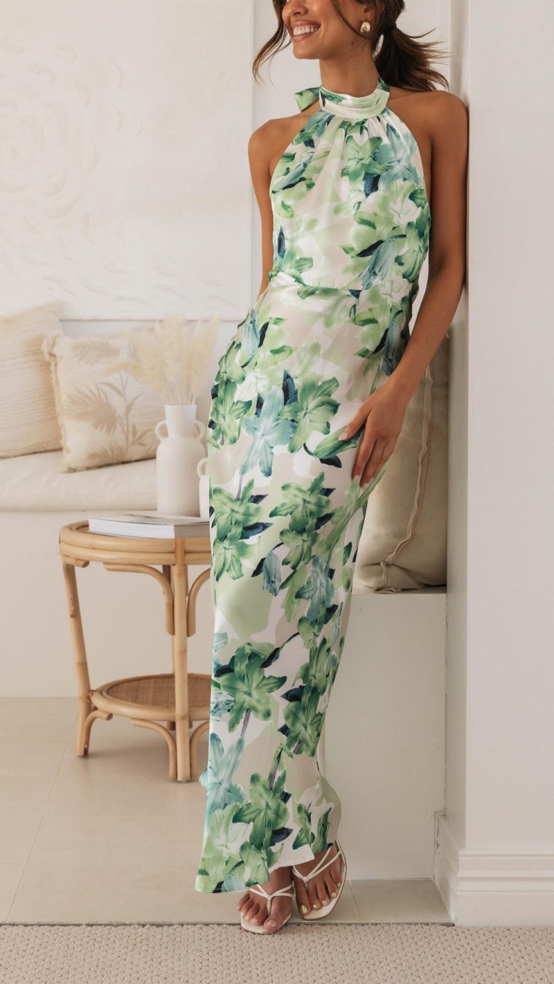 Ember | Damklänning med blomsterprint, halterneck och öppen rygg, maxiklänning