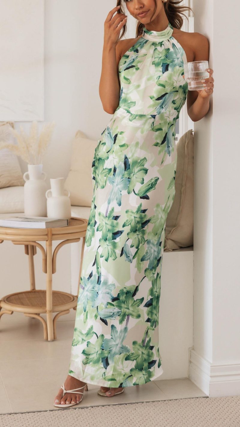 Ember | Damklänning med blomsterprint, halterneck och öppen rygg, maxiklänning