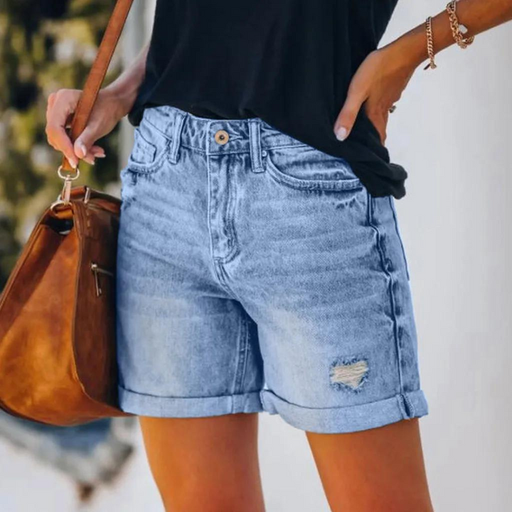Högmidjade jeansshorts med insliten look - Molly